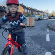 Ewan's son Ethan riding his bike in the active neighbourhood