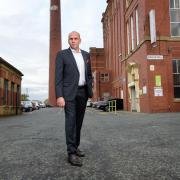 Ultimate Products founder and CEO, Simon Showman, outside Manor Mill in Chadderton, where the business is based