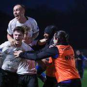 GET IN: Avro players celebrate Max Davidson’s winner against Irlam Picture: Alicia Day