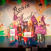 Oldham Coliseum cast members on stage with MP Debbie Abrahams
