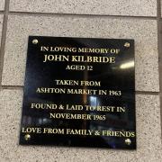 The plaque is in memory of John Kilbride, who was murdered at the age of 12