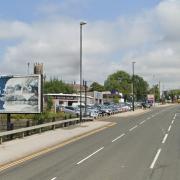 The current paper advertising board on Huddersfield Road, which would have been changed to an equivalent-sized screen
