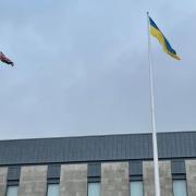 The Ukrainian flag being flown above the Civic Centre in Oldham