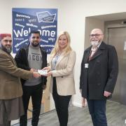 Left to right: Imam Fazail Ahmed Sialvi, Azad Hussain, Rebecca Morrish of Oasis Academy Clarksfield, and Oasis' Chris O'Donnell