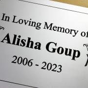 The plaque reads 'In Loving Memory of Alisha Goup 2006-2023'