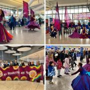The group performed to travellers at Heathrow to raise awareness to disabilities