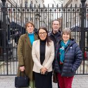 Debbie Abrahams, along with members of the Filo Project, outside Downing Street