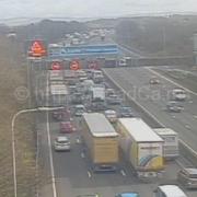 Updates as two lanes closed causing delays on M62 following crash