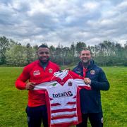 New signing McKenzie Yei with Roughyeds head coach Sean Long