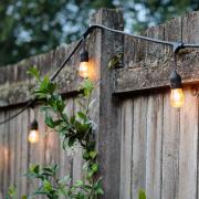 Check to see if you can hang or attach items to a neighbour's fence.