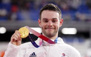 CHAMPION: Matt Walls with the gold medal he won in the omnium event at the Tokyo Olympics