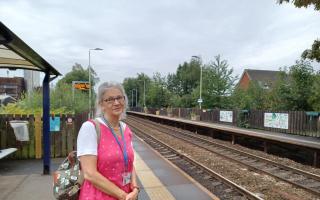 Lynne Oakley standing at Mills Hill station
