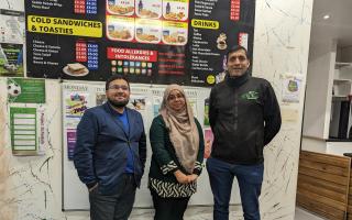 Left to right: Nurul Hoque, Kohinoor Begum, and Abid Hussain stand in the Greenhills centre