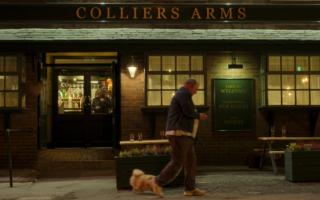 Mark Addy as Dave walking his dog outside the Colliers Arms