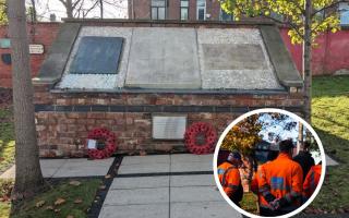 Staff from the Oldham company paid their respect to employees who died in the first and second world war