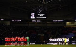 Bolton Wanderers and Luton Town players during a minute silence for Bolton Wanderers fan Iain Purslow who died on Saturday, ahead of the Emirates FA Cup third round replay match at the Toughsheet Community Stadium, Bolton. Picture date: Tuesday January
