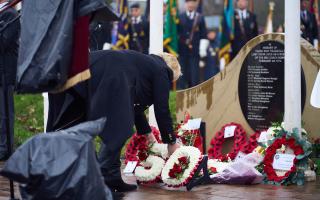 Wreaths were laid at the plaque honouring the victims