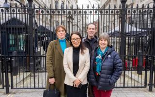 Debbie Abrahams, along with members of the Filo Project, outside Downing Street