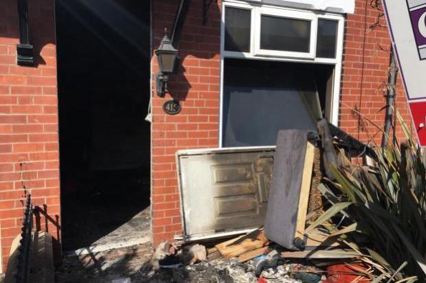 DAMAGE: The fire at the house in Tonge Moor Road on April 9